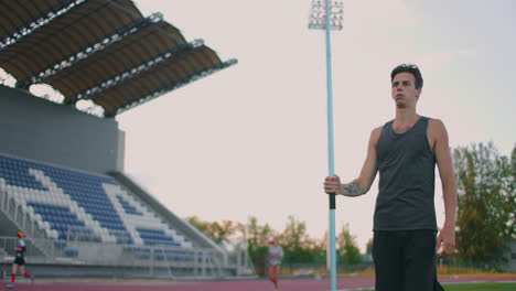A-male-athlete-throws-javelins-at-a-stadium-in-slow-motion.-Athletics-javelin-throw-Olympic-program